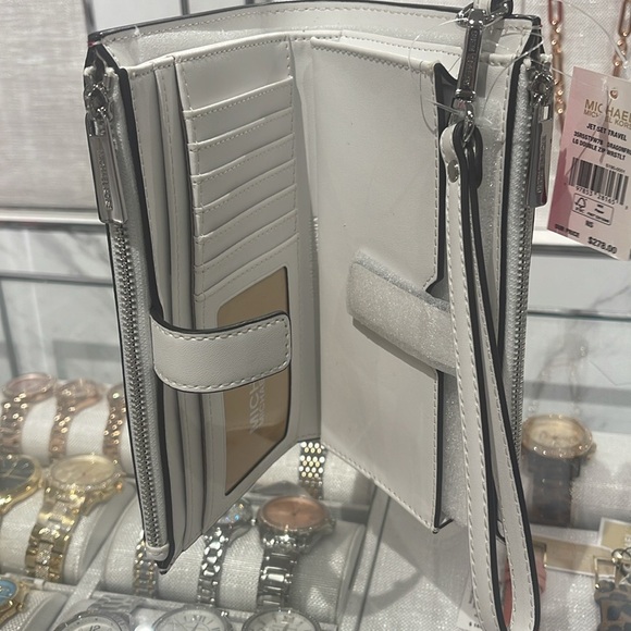 Michael Kors Jet Set Travel Lg Embellished Signature Logo Wristlet
Dragonfruit - Picture 8 of 16